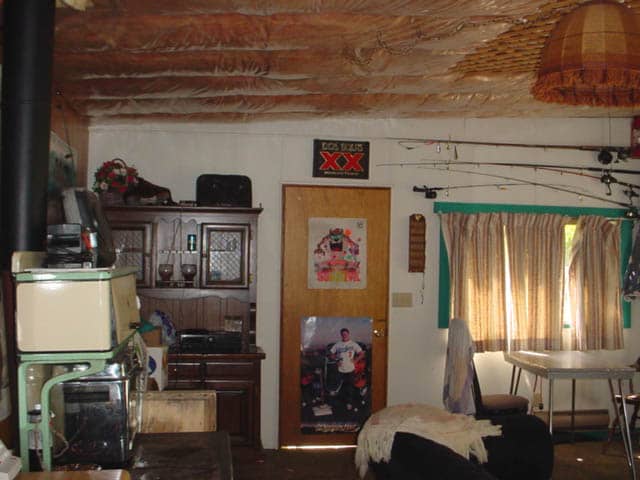 Front door of cabin before renovation